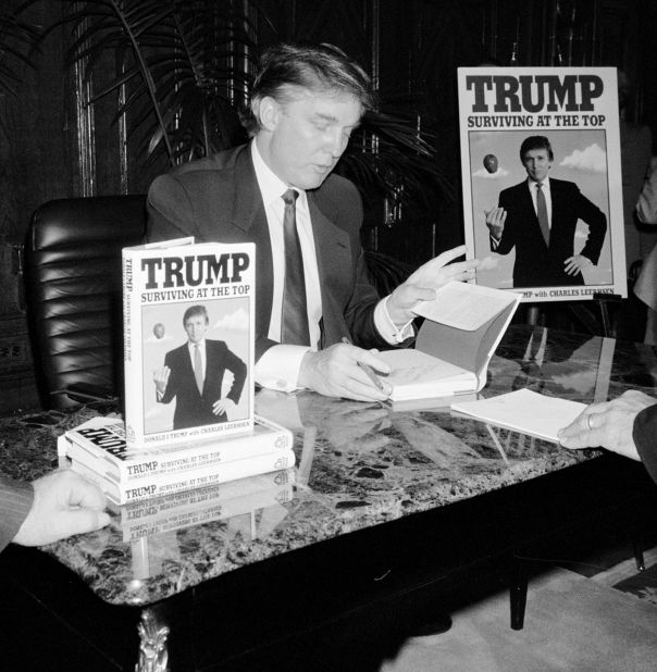 Trump signs his second book, 
